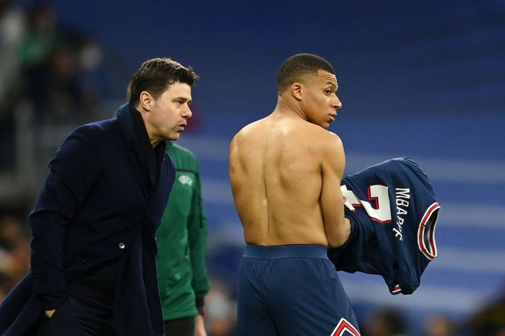 Pochettino gefur Mbappe orð í eyra.