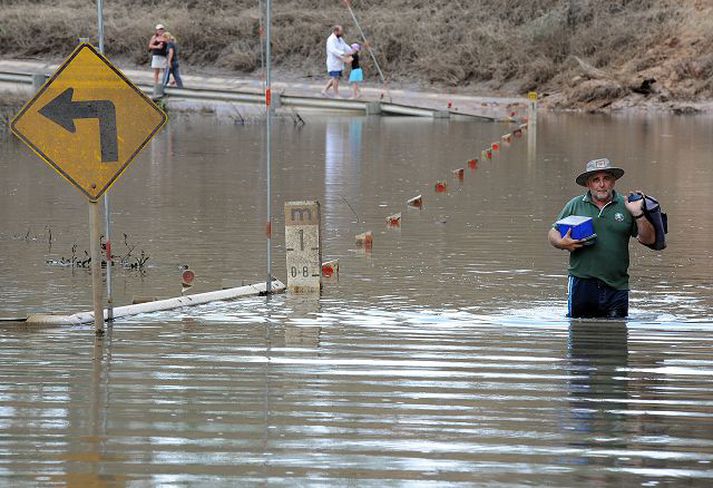 Flóðin hafa haft áhrif á um tvö hundruð þúsund manns í Queensland. Nordicphotos/afp