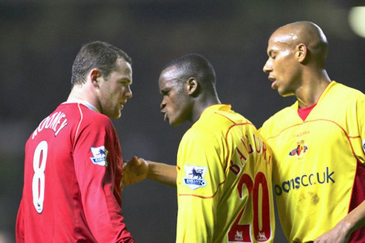 Al Bungara ræðir hér við Wayne Rooney, leikmann Manchester United.