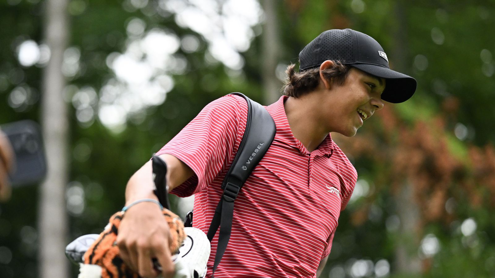 Komst á US Open-mótið með son Tiger Woods sem kylf
