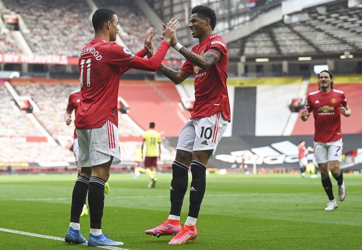 Mason Greenwood fagnar fyrra marki sínu í dag en það kom eftir frábæran undirbúning Marcus Rashford.