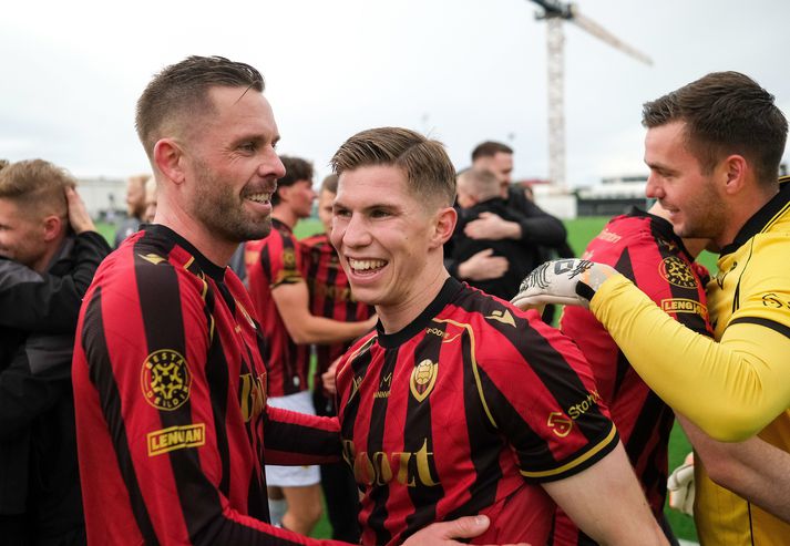 Gylfi Þór Sigurðsson og Hrannar Snær Magnússon glaðbeittir eftir að titillinn var í höfn í dag.