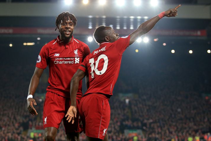 Sadio Mane og Divock Origi fagna marki á Anfield í gærkvöldi.