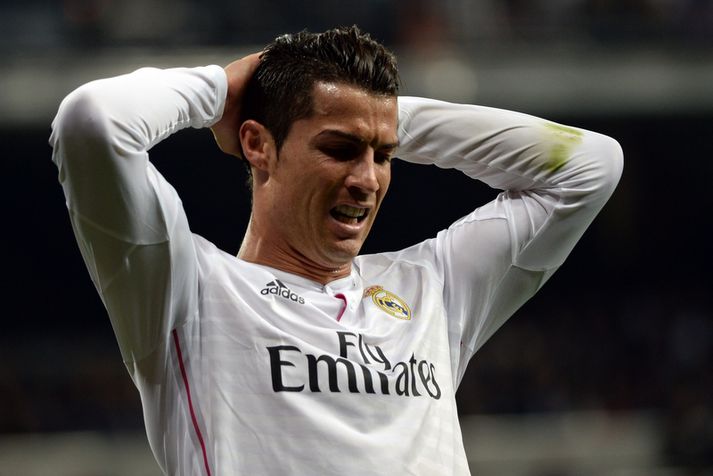 Cristiano Ronaldo skoraði tvö en var pirraður í gær.