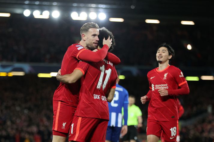 Jordan Henderson og Mo Salah fagna seinna marki Liverpool.