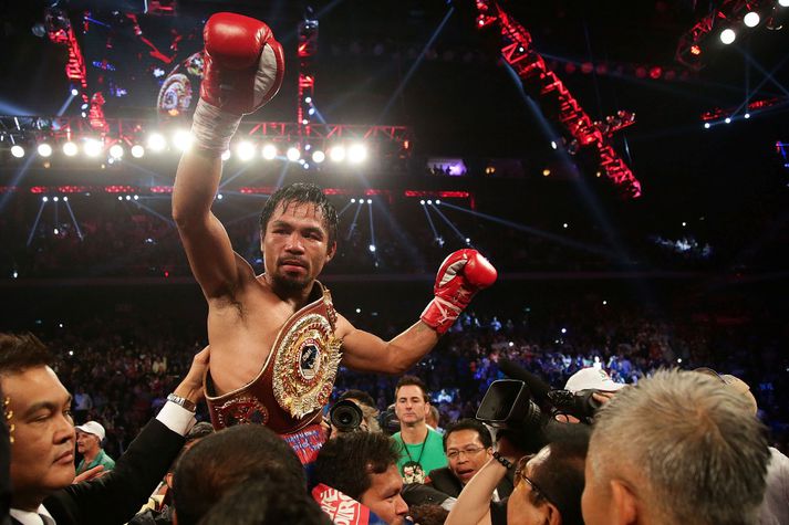 Pacquiao fagnar sigri í bardaga um síðustu helgi.