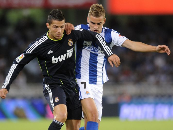 Antoine Griezmann í baráttunni við Cristiano Ronaldo á dögunum.