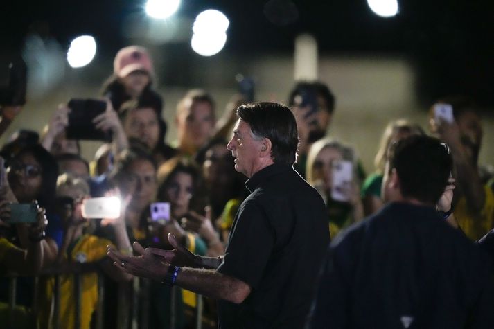 Jair Bolsonaro, forseti Brasilíu, stóð sig betur en kannanir gerðu ráð fyrir. 