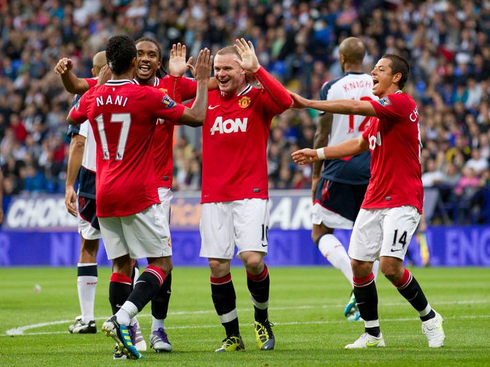 Wayne Rooney og félagar fagna í kvöld.
