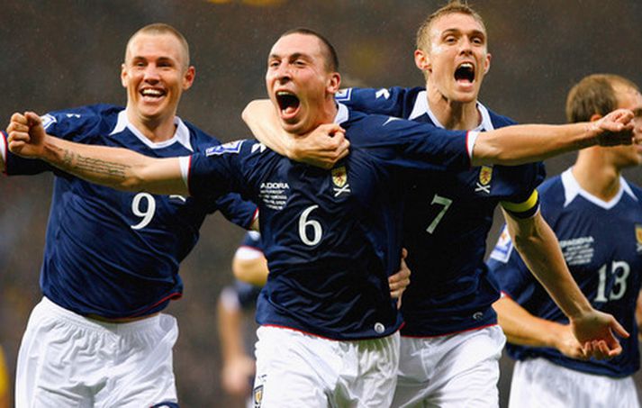Scott Brown fagnar marki sínu í dag.