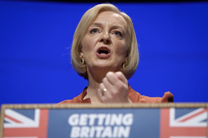 Britain's Prime Minister Liz Truss makes a speech at the Conservative Party conference at the ICC in Birmingham, England, Wednesday, Oct. 5, 2022. (AP Photo/Kirsty Wigglesworth)