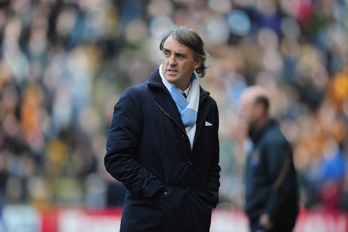 Mancini á hliðarlínunni með Man. City.