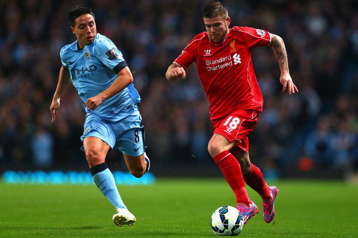 Alberto Moreno á fullri ferð fyrir meiðslin í gær.