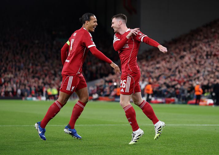 Andy Robertson á góðri stundu með fyrirliðanum Virgil van Dijk en þeir hafa spilað hlið við hlið í fjölda ára.