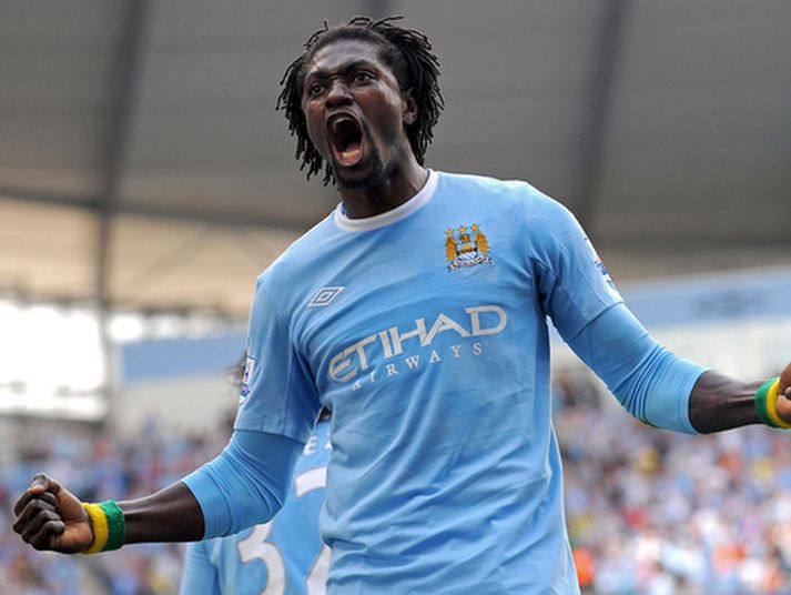 Emmanuel Adebayor fagnar einu marka sinna með Manchester City.