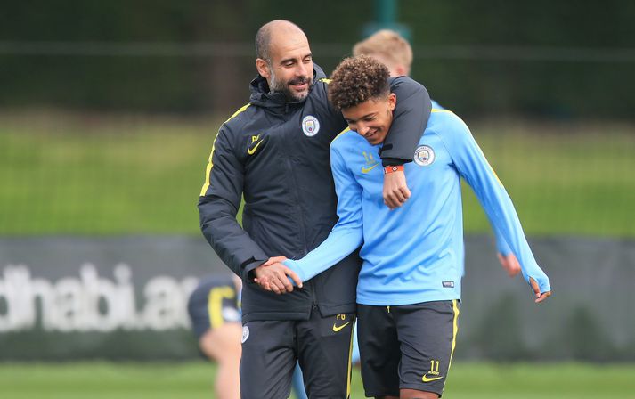 Pep Guardiola og Jadon Sancho áður en sá síðarnefndi fór til Dortmund.