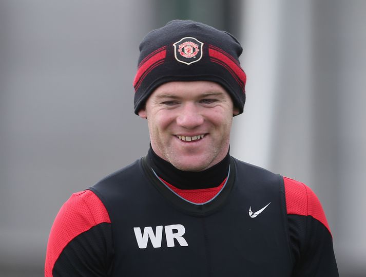 Wayne Rooney brosmildur á æfingu í dag. Eðlilega.