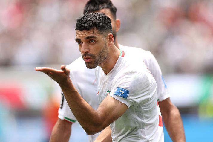 Mehdi Taremi fagnar marki sínu fyrir Íran á móti Belgíu. Markið fékk þó ekki að standa og leiknum lauk með markalausu jafntefli.