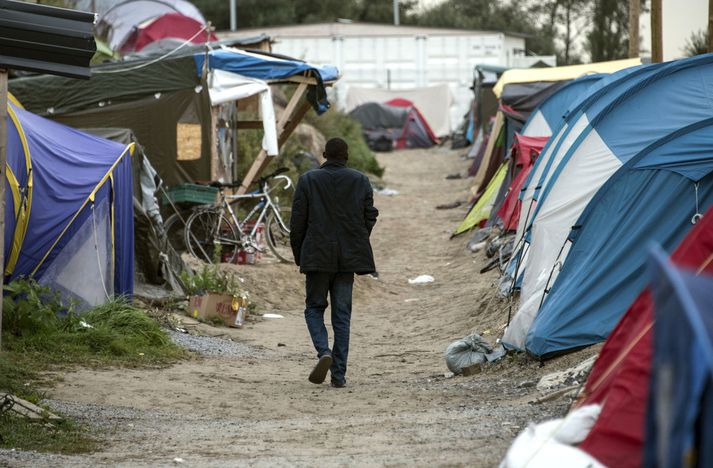 Flóttamaður í Calais-búðunum, þar sem allt að tíu þúsund manns búa við lélegar aðstæður.