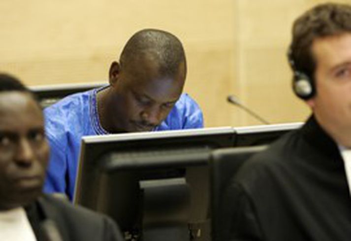 Thomas Lubanga, í miðju, við upphaf fyrirtöku Alþjóðlega Sakamáladómstólsins í Hollandi í nóvember sl.