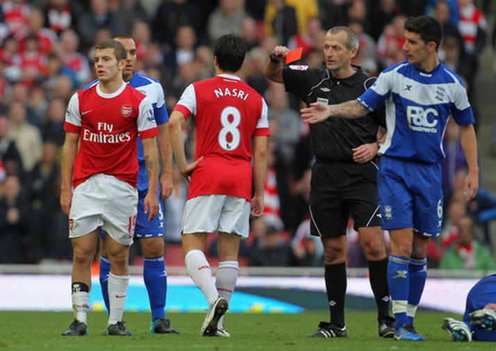 Jack Wilshere eftir að rauða spjaldið fór á loft í dag.