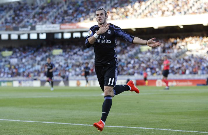 Bale fagnar marki í leik með Real Madrid.
