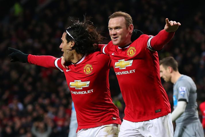 Rooney fagnar með Falcao