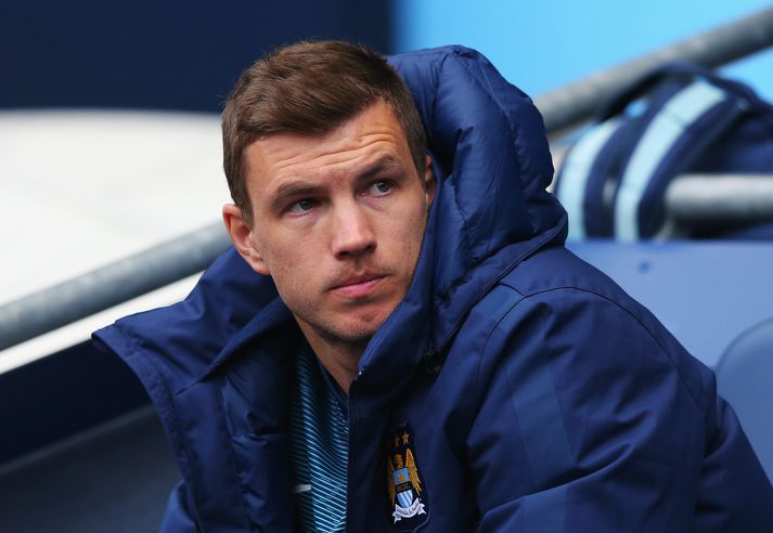 Dzeko hefur setið töluvert á bekknum hjá Manchester City.