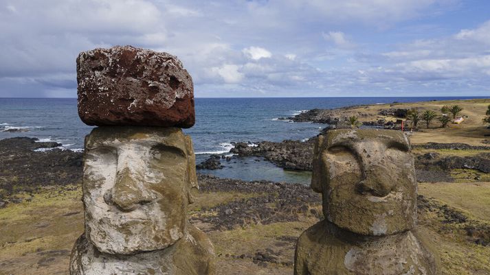 Moai-styttur á Ahu Tongariki á Páskaeyju. Sjórinn gæti náð þeim seinna á þessari öld vegna hækkandi yfirborðs sjávar.