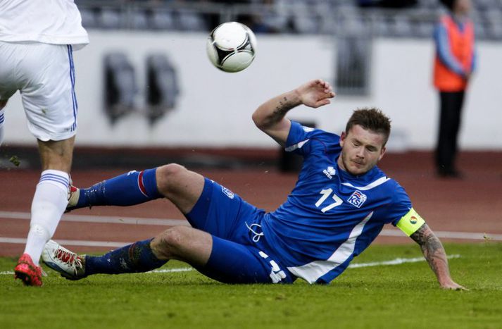 Aron Einar Gunnarsson í leik með íslenska landsliðinu.