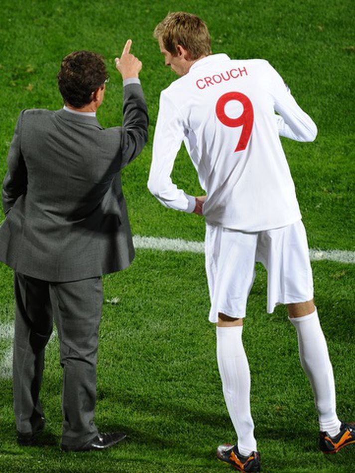 Peter Crouch og Fabio Capello.
