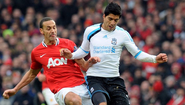 Rio Ferdinand og Luis Suarez.