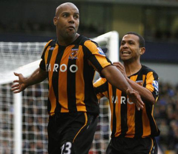 Marlon King fagnar marki.