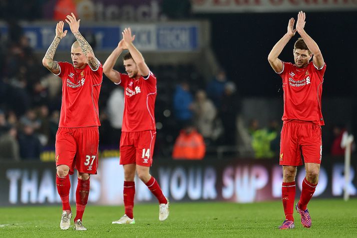 Martin Skrtel, Jordan Henderson og Steven Gerrard.