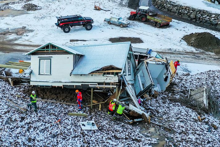 Mörg hús skemmdust mikið eða alveg í aurskriðunum í desember.