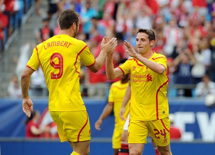 Rickie Lambert og Joe Allen fagna marki þess síðarnefnda.