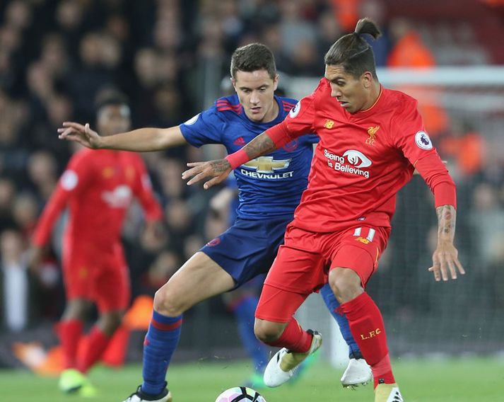 Herrera í baráttu við Firmino í kvöld.