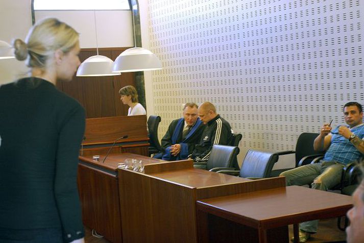 Í héraðsdómi Saulius Prusinskas og Arvydas Maciulskis sýndu lítil svipbrigði þegar dómurinn var kveðinn upp.