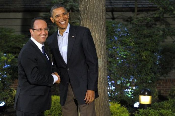 Barack Obama, forseti Bandaríkjanna, heilsar hér Francois Hollande, forseta Frakklands.