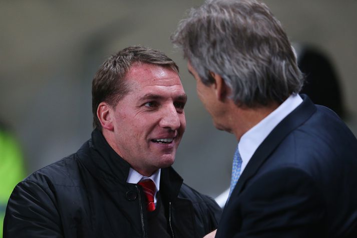 Brendan Rodgers ræðir við Manuel Pellegrini fyrir leik liðanna