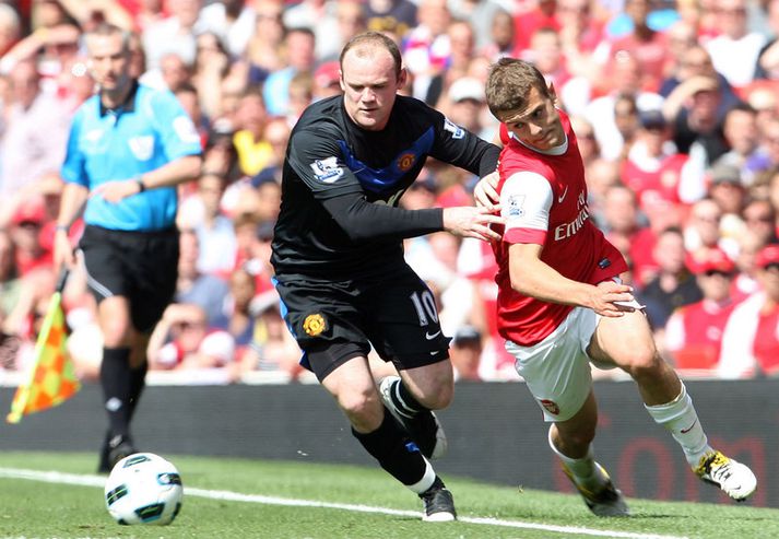 Jack Wilshere og Wayne Rooney.