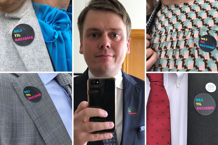 Margir þingmenn úr hinum mismunandi stjórnmálaflokkum sýndu þá óánægju sína í ljós með því að bera sérstaka límmiða til höfuðs rasisma með áletruninni "Nej til racisme“ eða "Nei við kynþáttahyggju“.