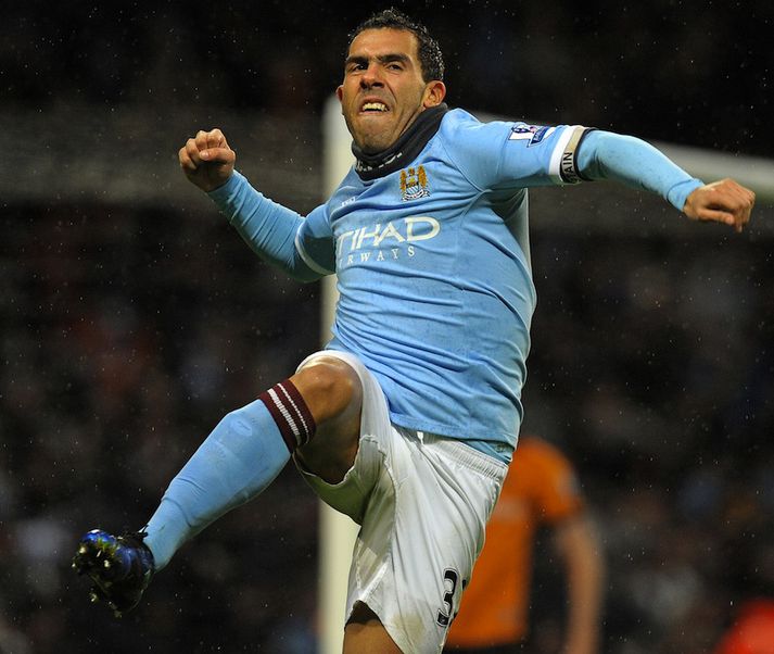 Tevez fagnar í dag.