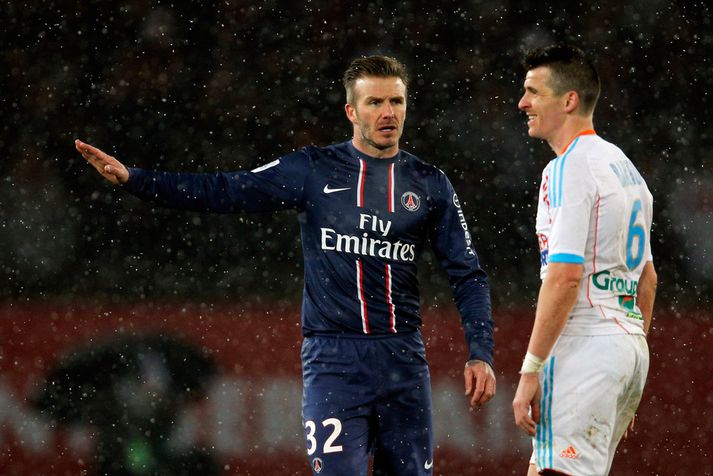 David Beckham ræðir við Barton í leik PSG og Marseille fyrr á þessu ári.