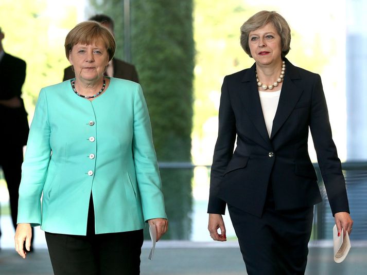 Angela Merkel og Theresa May í dag.