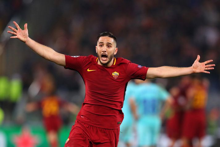 Kostas Manolas fagnar markinu sínu á móti Barcelona í átta liða úrslitunum í fyrra.