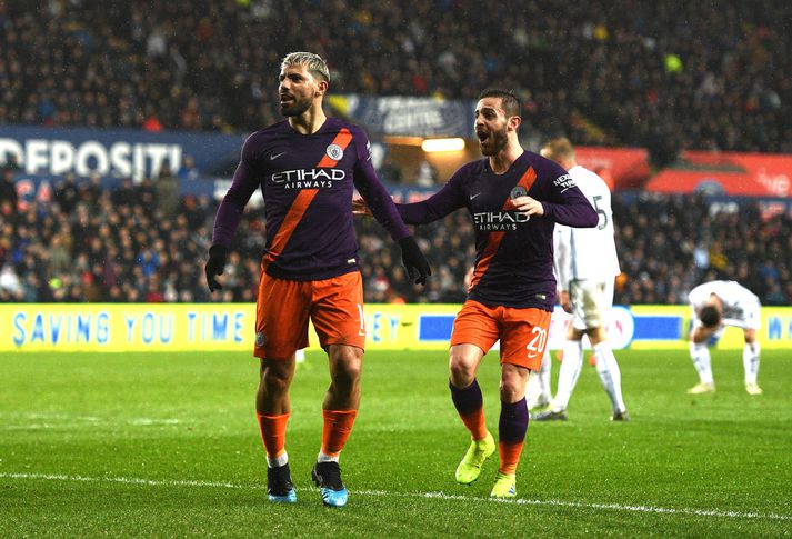 Sergio Aguero og Bernardo Silva fagna einu af mörkum Manchester City um helgina.