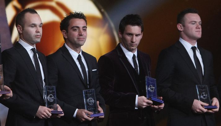Fjórir öflugir - Iniesta, Xavi, Messi og Rooney.