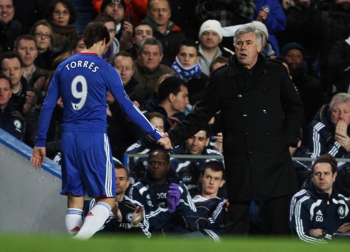 Torres fer af velli gegn Liverpool.