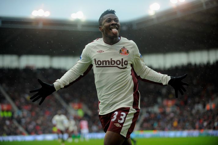 Gyan fagnar marki sínu í dag. Það dugði ekki til.